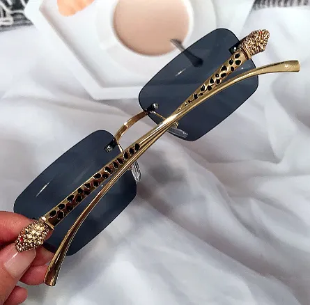 فريدة من نوعها سبيكة ليوبارد الساق الفاخرة . Unique Alloy Leopard Leg Luxury Brand Sunglasses Men