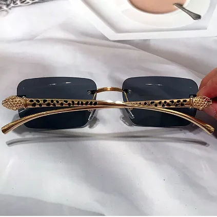 فريدة من نوعها سبيكة ليوبارد الساق الفاخرة . Unique Alloy Leopard Leg Luxury Brand Sunglasses Men
